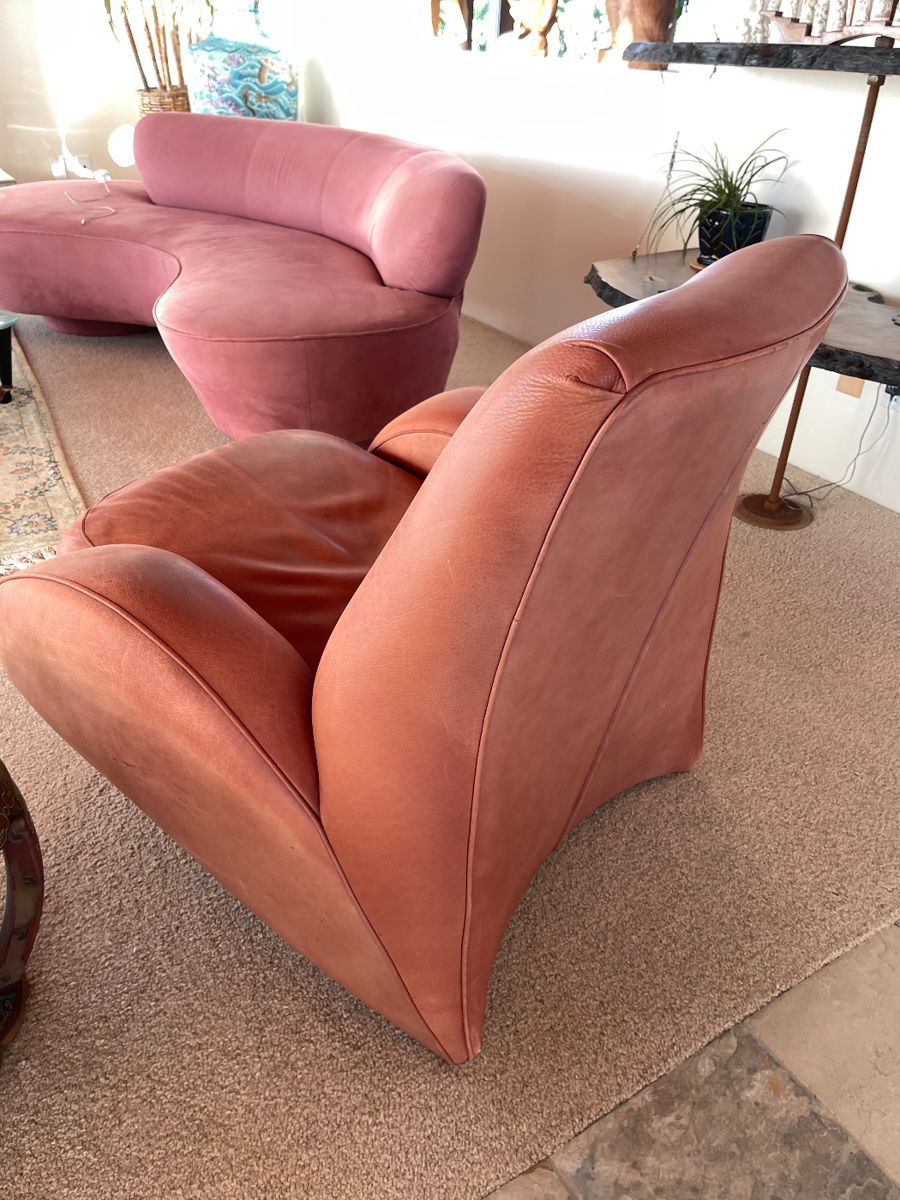 Pair of rose leather chairs