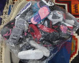 a freezer ziplock of baby jordan soft bottom sneakers roughly 15 pairs $300 spacejam , old school ones