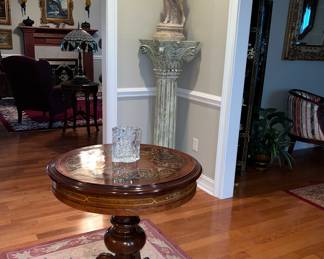 round table with hand painted top - brass applique on legs - cast statue (not solid) on plastic pedestal