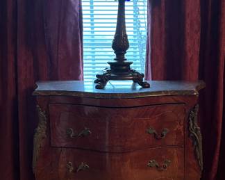 Tiffany style lamp on Louis XV style chest