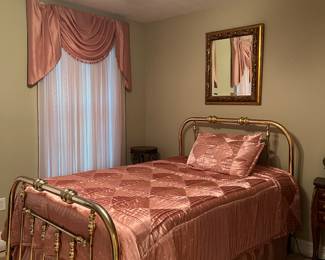 Older brass bed with Beauty Rest Pillow Top mattress