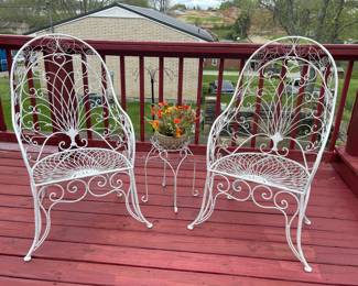 UNBELIEVABLE Mid Century wrought iron chairs. You do not come across these often!