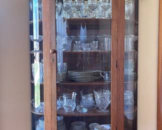 Vintage display cabinet with clawed feet. 
