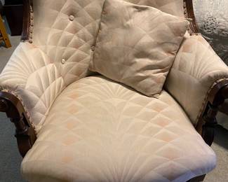 Beautifully upholstered barrel chair in pristine condition