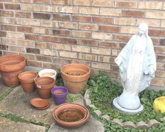 Flower pots, blessed Virgin Statue