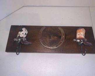 Coat or hat rack. With horseshoe and cowboy boot hooks. 6 x 17