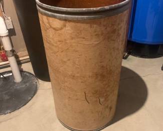 Cardboard barrel. 31 x 17. Includes contents. Located in the basement