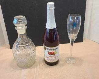 Decanter, sparkling apple-pomegranate juice, wine glass