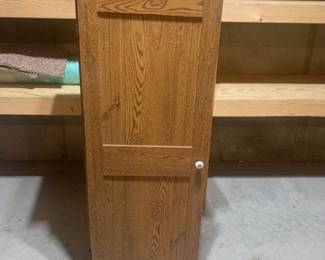 Storage cabinet. 52 x 21.5 x 13. Located in the basement