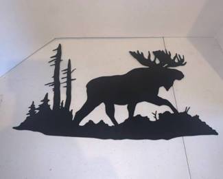 Metal wall decor. 13 x 23. Moose and trees cut out