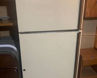 GE refrigerator. 66.5 x 30.5 x 31. Located in the basement