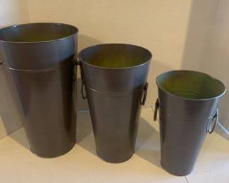 3 Metal canisters. Tallest is 14 inches