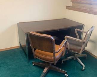 2 Office chairs with metal desk. 29 x 60 x 30. Located in the basement