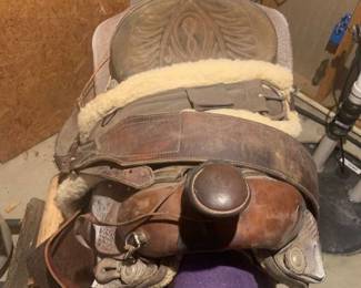 Horses saddle with blanket Located in the basement