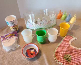 Plastic bowl, popsicle makers, plastic Kool-aid cups, streamer, baby bib, more.