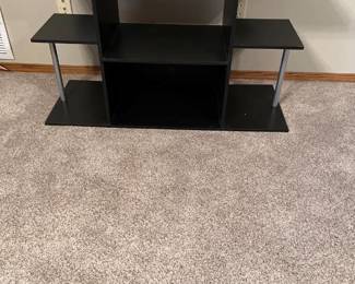 TV stand 25 x 42 x 16 Located in the basement
