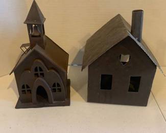 2 Metal churches. Both are candle holders