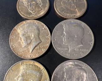 Four Kennedy Half Dollars and Three Presidential Dollars