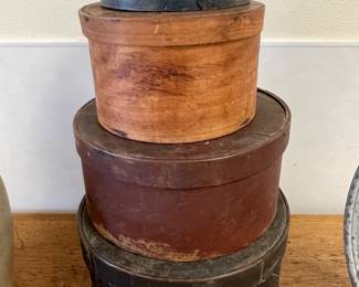 Round Wooden Pantry Boxes, some in old paint.