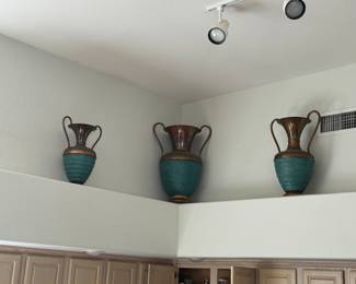 Three copper pots