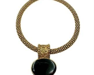Lot 092   
Gold Tone Collar Necklace with Black Pendant