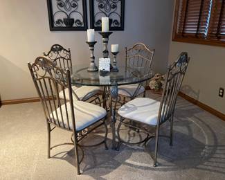 . . . love this wrought-iron glass table and chair set