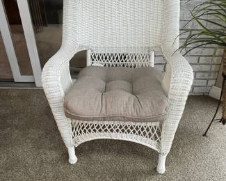 . . . and matching white wicker chair