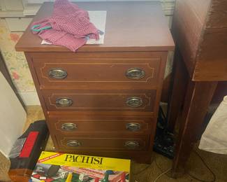 Small 4 drawer cabinet.  Would make a great nightstand or end table. 