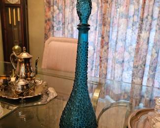 Vintage genie bottle blue teal bubbles