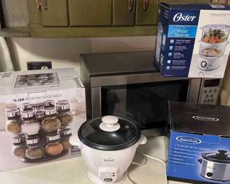 Small Kitchen Appliances And A Rotating Spice Rack. 