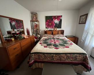 Vintage bedroom set which includes bed, nightstand, chess of drawers, and dresser with mirror