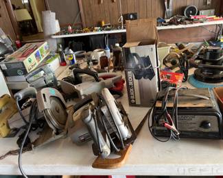All purpose, charger, circular, saw, garage, full of tools
