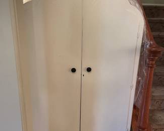 Painted armoire/linen cabinet by Klamer with doors closed