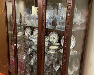 Beautiful wood carved crystal and china display cabinet.  51-1/2" high x 64" wide x 15" deep - China and glassware not for sale 
