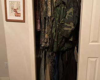 Hunting clothes and MORE in the garage (shoes, head coverings, gloves, camping gear, etc.)  