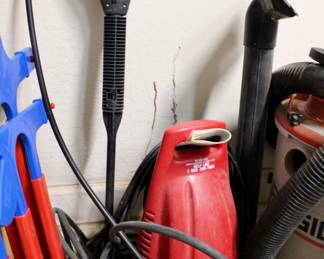 Various power tools and yard supplies