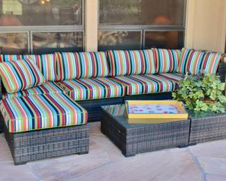 Wicker couch and table patio set: made from special wicker that can withstand the heat! Sunbrella fabric too.