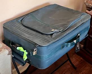 Blue suitcase and stand 