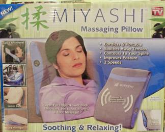 Massaging, vibrating pillow to relieve sore muscles