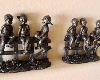 Vintage children sculpture of little boys 