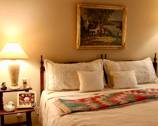 King-sized bed, mattress, and sheets which can be split into 2 twin beds