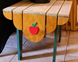 Side table with apple design 