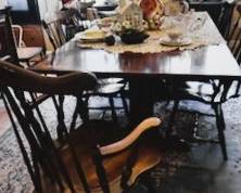 Antique Hitchcock dining table and chairs with 2 leaves. Showing with one leaf in. We have other Hitchcock chairs too!