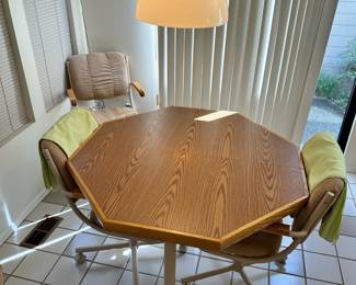 1960's Octagon Dining Table with Rolling Dinning Chairs