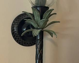Pair of coastal metal glass globe palm leaf wall mount candle holders.