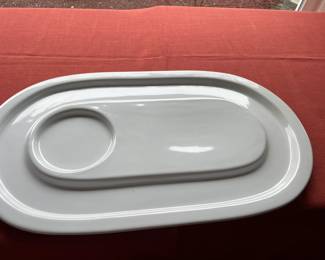 White plate with cup holder.