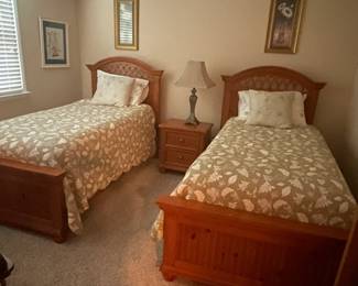 Pair of twin beds and end table.