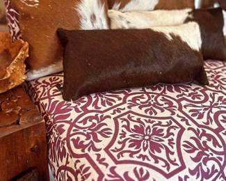 Side chair and cow hide pillows CHAIR IS HALF OFF