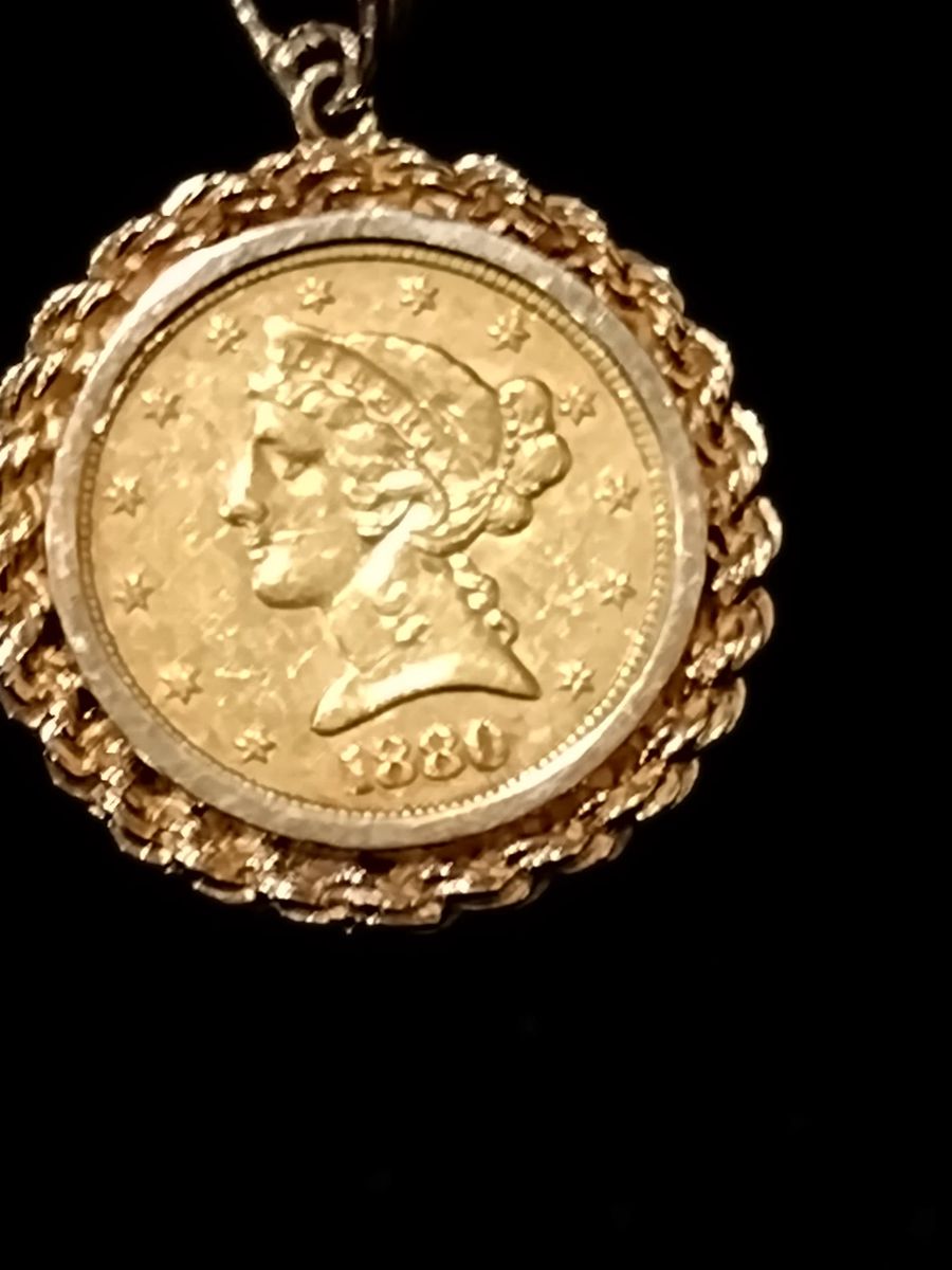 1880 $5 gold coin. With 14 karat bezel and 30" chain.