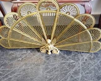 Antique peacock fireplace fan 